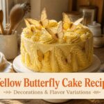 Yellow butterfly cake with buttercream frosting and piped butterflies on top.